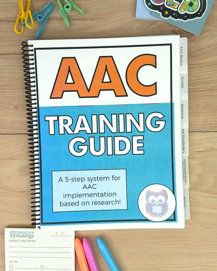 The coil-bound AAC Training Guide with tabbed sections